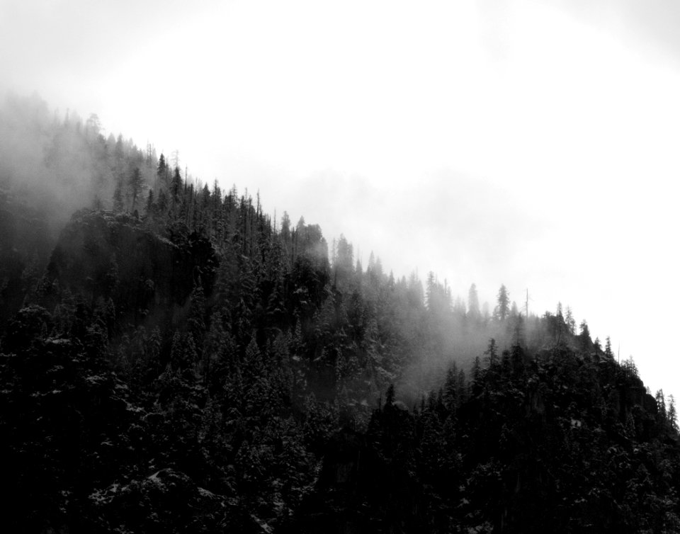 Aerial Photo Of Foggy Black And White Mountain