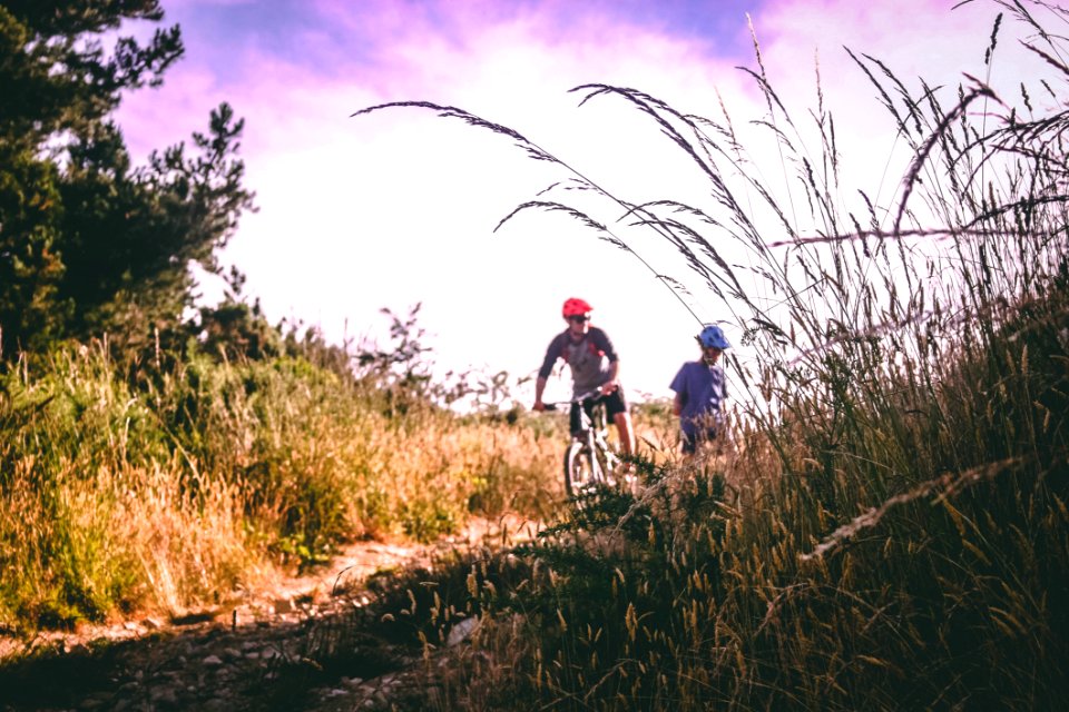 Two People Riding Bicycle photo