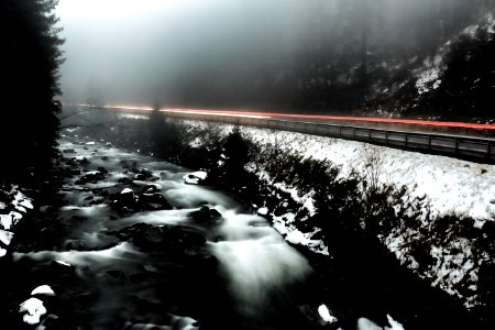 Time Lapse Photo Of River Beside Highway During Cloudy Weather