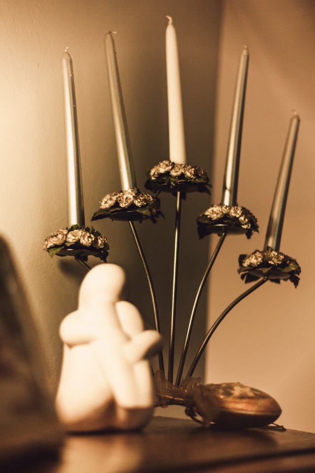Gray Floral Candelabra On Brown Wooden Surface