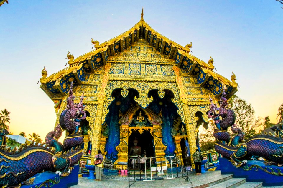 Photo Of Gold-colored Altar With Dragon Figurines