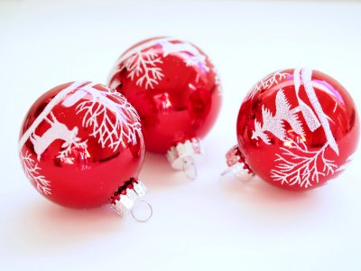 Three White-and-red Christmas Tree Printed Baubles photo