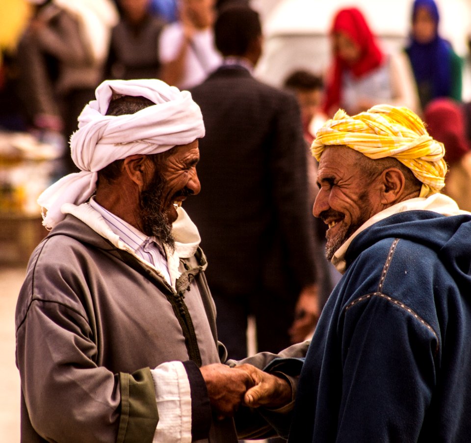Two Man Smiling Each Other