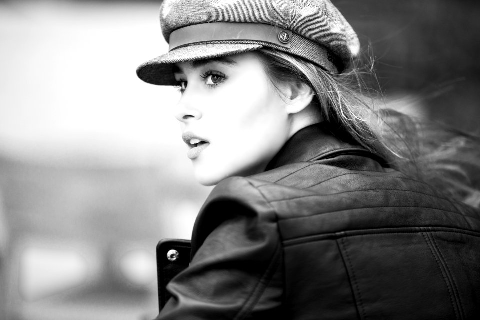 Grayscale Photo Of Woman In Black Leather Jacket