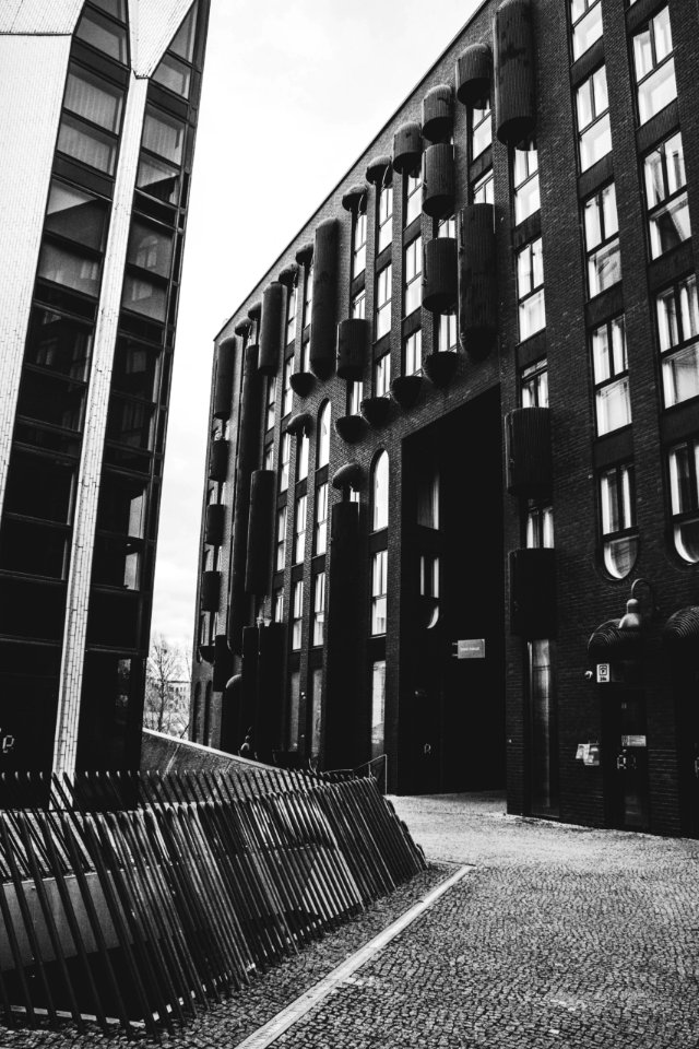 Grayscale Photo Of Concrete Buildings photo