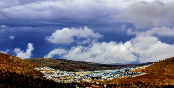 Aerial Photo Of Mountain And City
