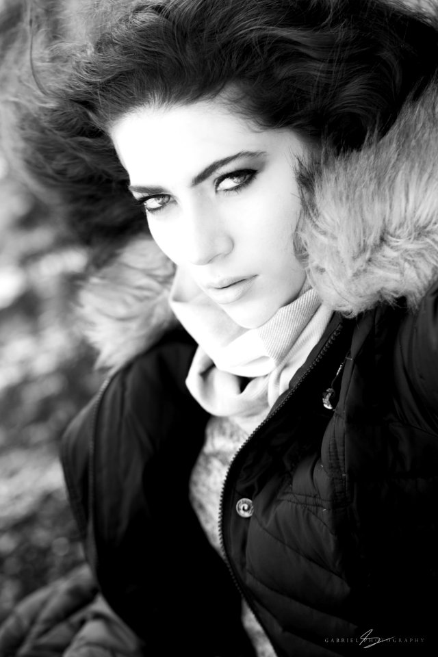 Photo Of Woman Wearing Brown And Black Zip-up Parka Jacket