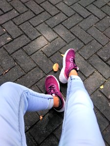 Person Wears Purple Low-top Sneakers photo