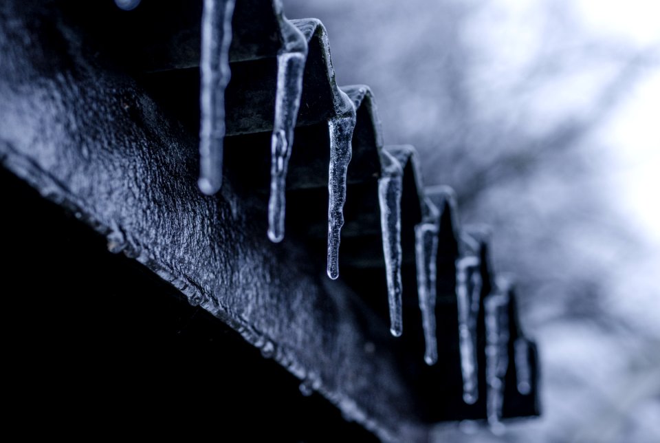 Close-up Photography Of Ice Crystals On Edges Of Corrugated Sheets