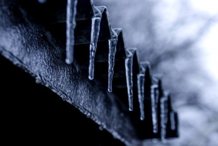 Close-up Photography Of Ice Crystals On Edges Of Corrugated Sheets