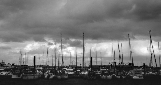 Gray Scale Photo Of Group Of Boats photo