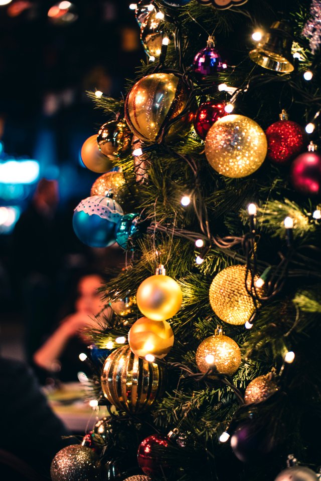 Green And Gold-colored Lighted Christmas Tree