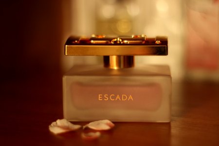 Escada Perfume Bottle On Table photo
