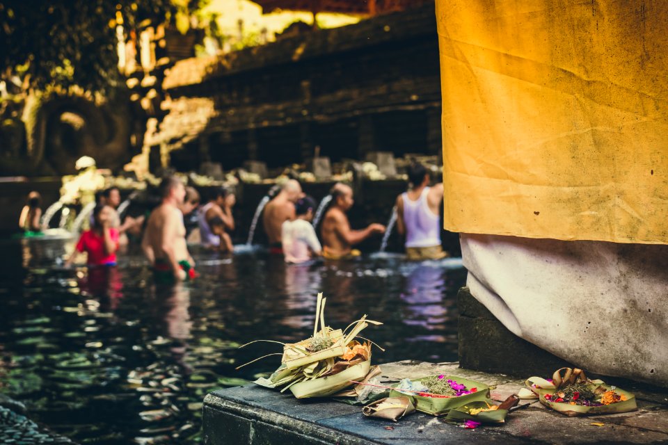 Photo Of People In The Body Of Water Taking A Bath