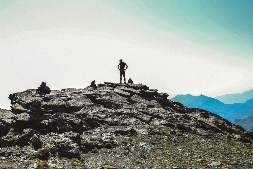 Person Standing On The Cliff
