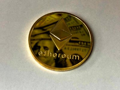 Round Gold-colored Ethereum Ornament photo