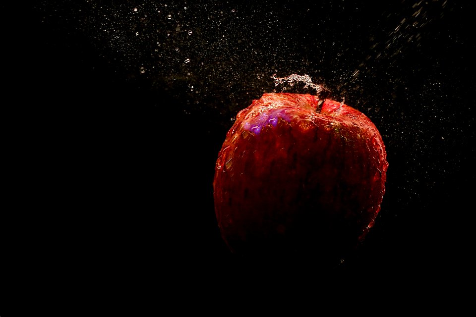 Time Lapse Photography Of Falling Red Apple