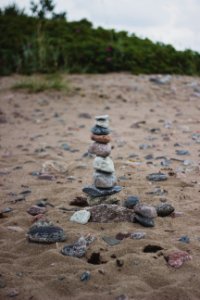 Stack Of Stones On The Middle Of Brown Soil