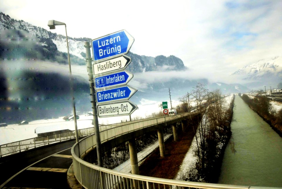 Road Sign Post Under The Cloudy Sky