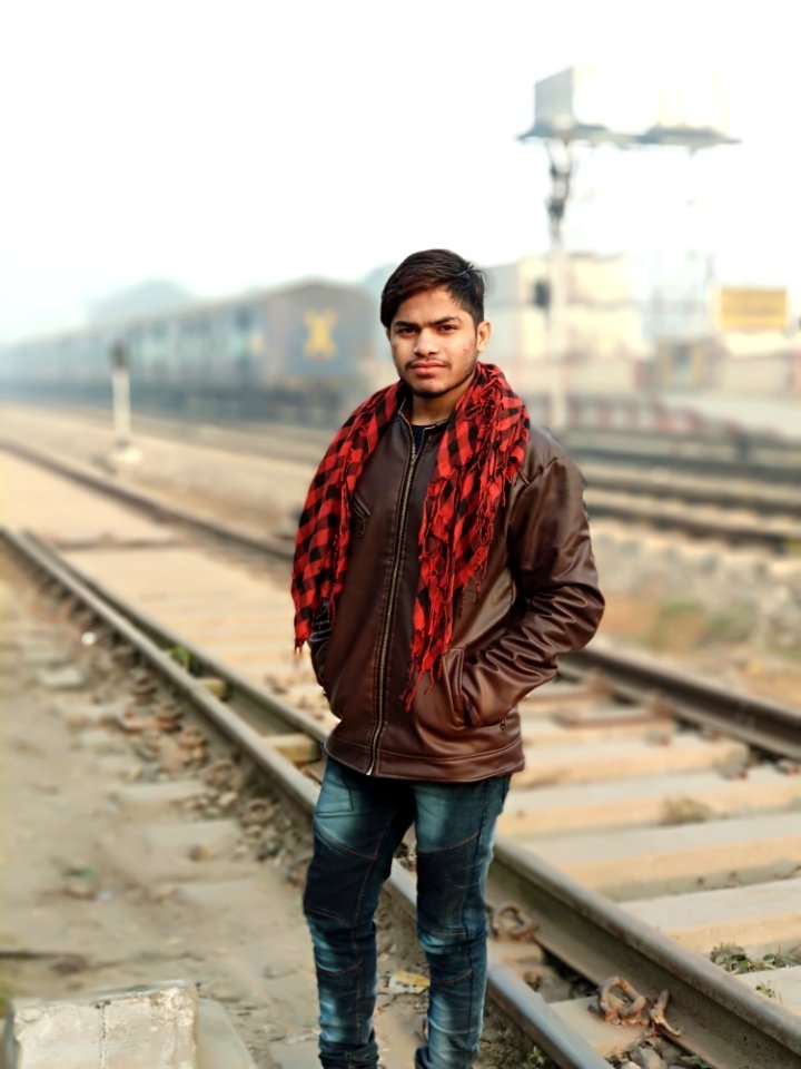 Man Wearing Brown Full-Zip Jacket photo