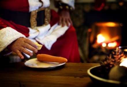 Person Holding Cheese Putting On White Plate
