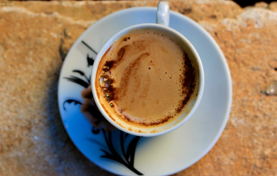White Ceramic Mug With Coffee And White Ceramic Saucer