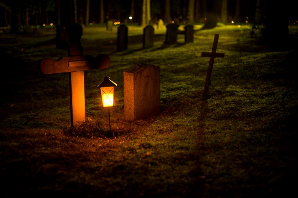 Selective Focus Photo Of Cemetery Lantern