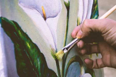 Person Taking A Painting