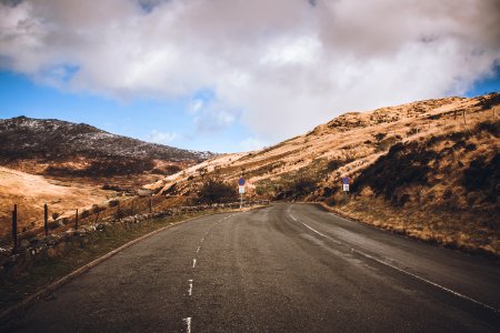 Concrete Road Near Mountains photo