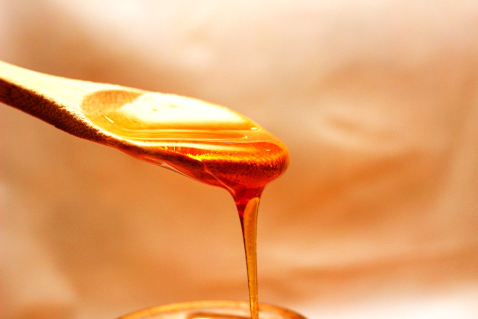Close-up Photography Of Honey