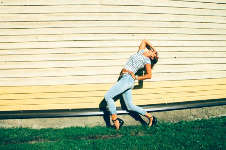 Woman In Blue Jeans And Stripes Crop Top