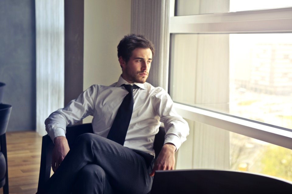 Man Wearing White Dress Shirt And Black Necktie photo