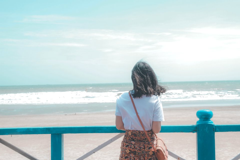 Woman Standing Near Seashore