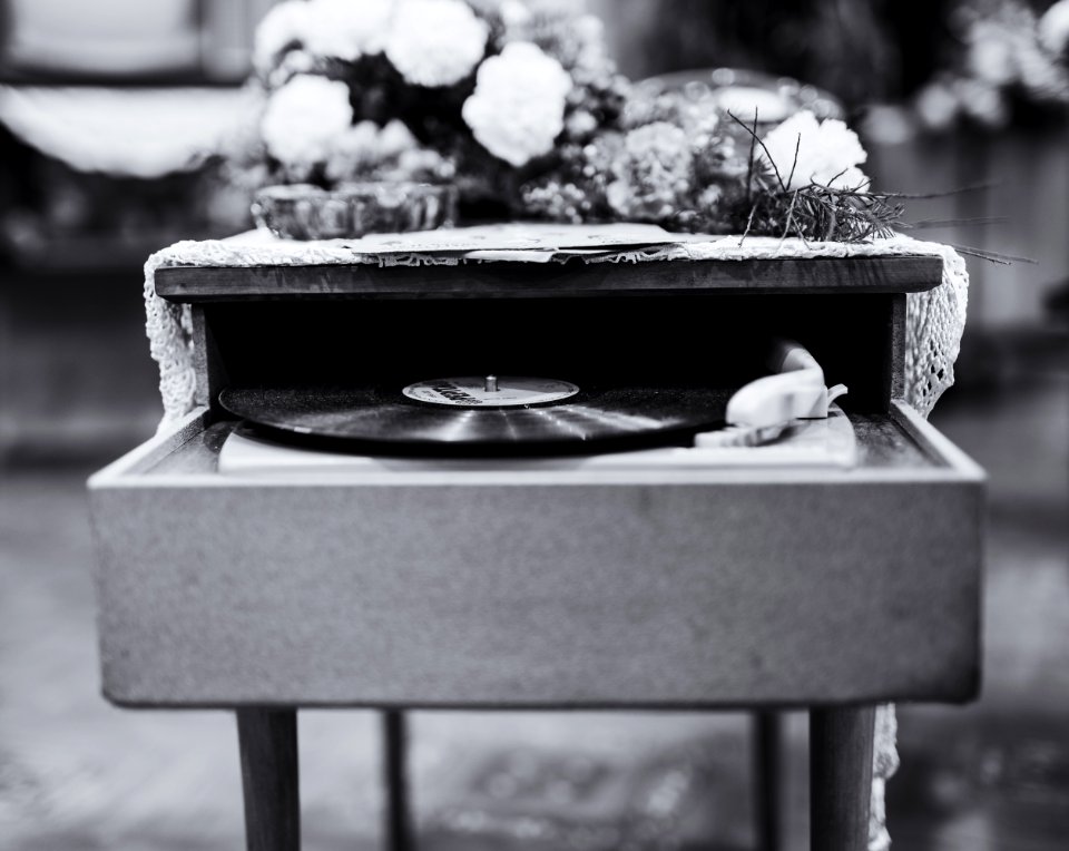 Grayscale Photo Of Vinyl Record Album Playing In Turntable