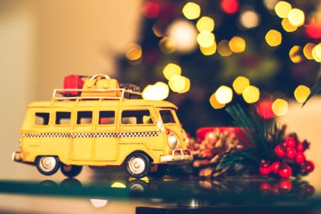 Selective Focus Photography Of Yellow Vehicle Scale Model photo