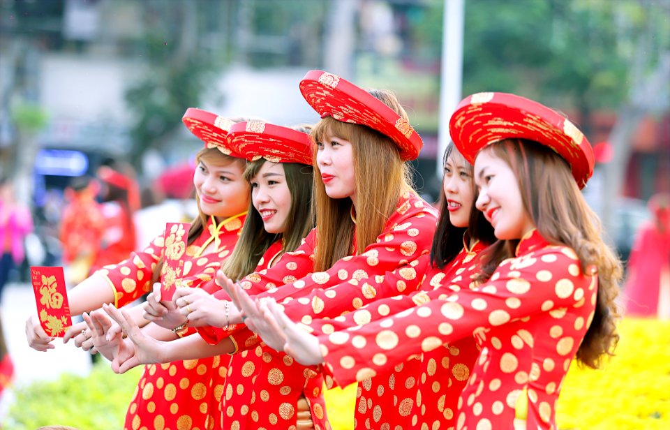 Five Women In Red And White Polka Dot Cheongsam Dress Standing