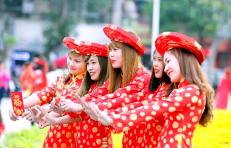 Five Women In Red And White Polka Dot Cheongsam Dress Standing