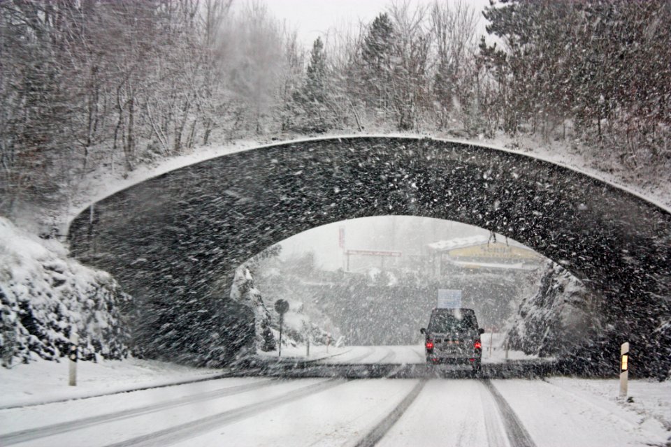 Photo Of White Vehicle Crossing A Tunnel