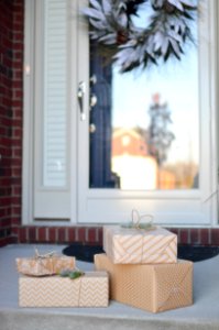 Three Beige Colored Boxes On The Floor