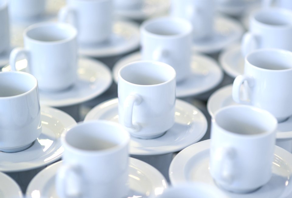 White Ceramic Teacups With Saucers photo