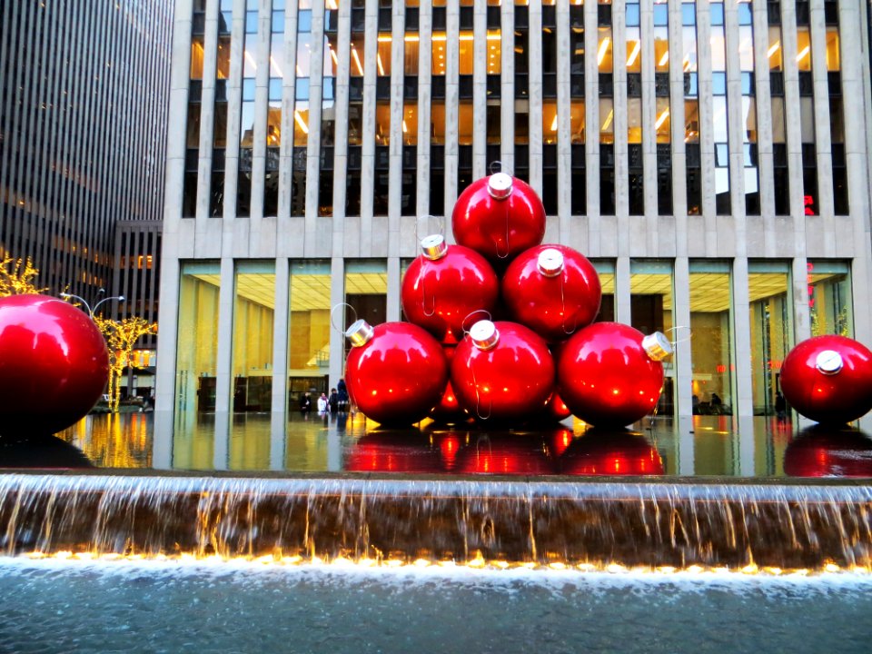 Red Baubles Near Grey High-rise Building