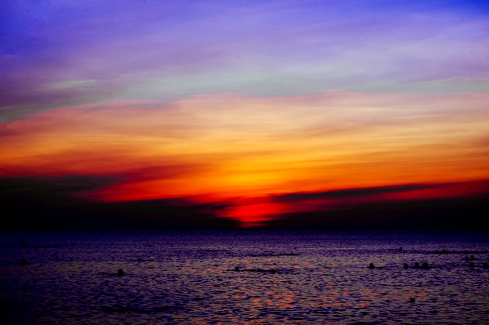 Body Of Water During Sunset
