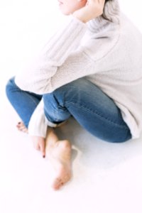 Woman In Gray Sweater And Blue Denim Jeans
