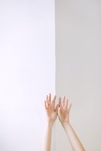 Person Two Hand Leaning On Wall photo