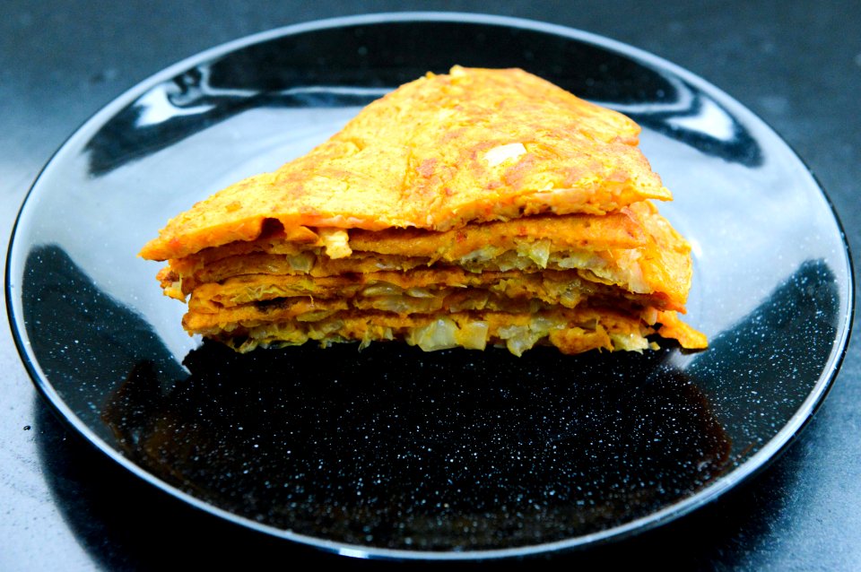 Stack Of Pancakes On Round Black Ceramic Plate