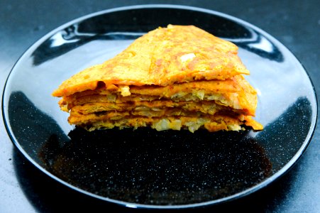 Stack Of Pancakes On Round Black Ceramic Plate