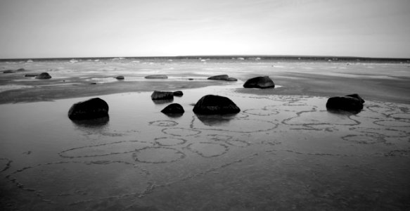 Grayscale Concrete Stones On Sand photo