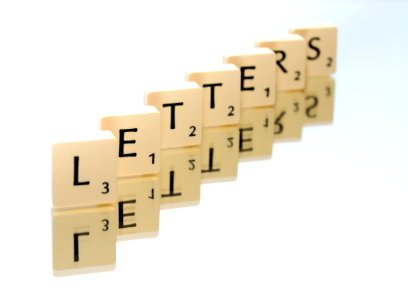 Scrabble Tiles Arranged In Letters Text