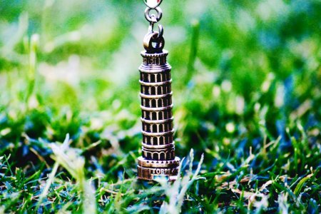 Leaning Tower Of Pisa Pendant On Green Grass At Daytime photo
