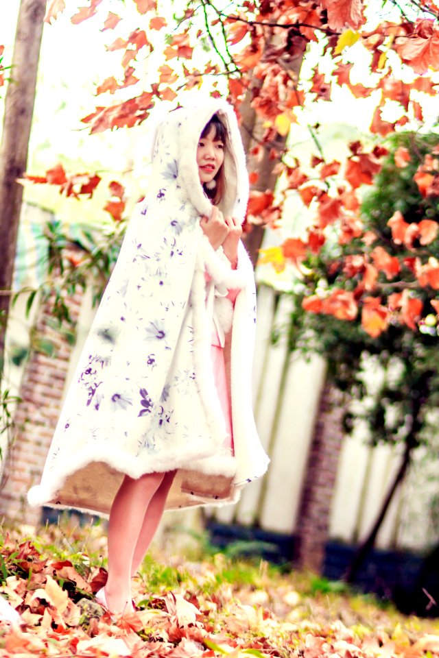 Woman Wearing Cloak